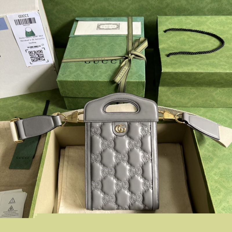 G*u*i top handle bags